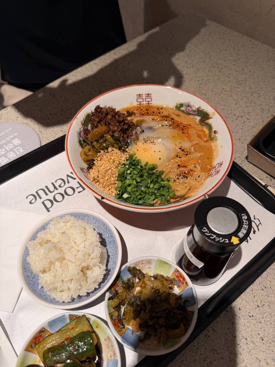 Tantan men noodle soup with egg ground pork peanuts and scallions Seoul food court