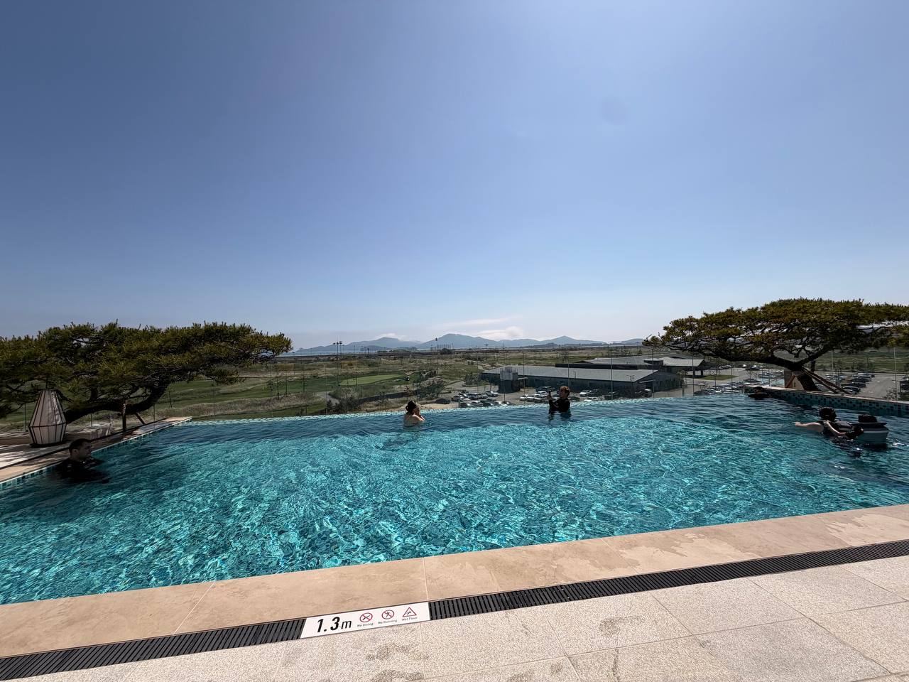 Cimer Spa indoor pool area with colorful features at Paradise City