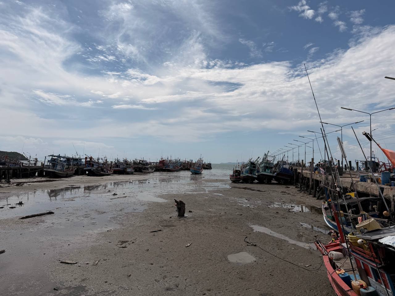 Fishing boats at Bang Saray pier at low tide Sattahip Pattaya