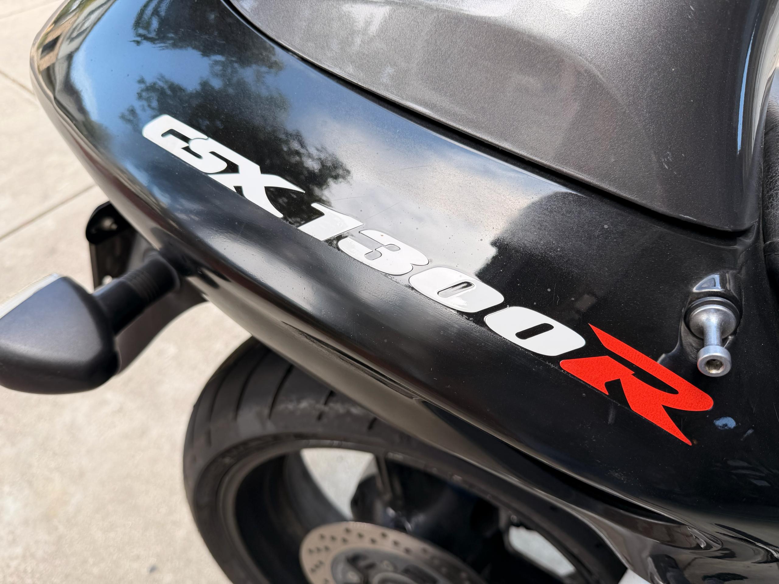 Suzuki GSX1300R Hayabusa badge close-up
