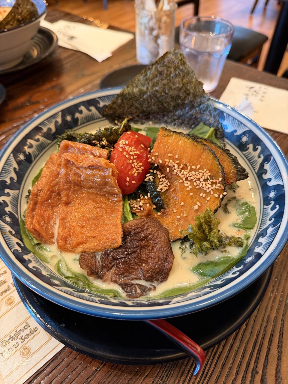 Second bowl of Hinodeya Creamy Vegan Ramen with aburaage, kabocha squash, and grilled mushroom